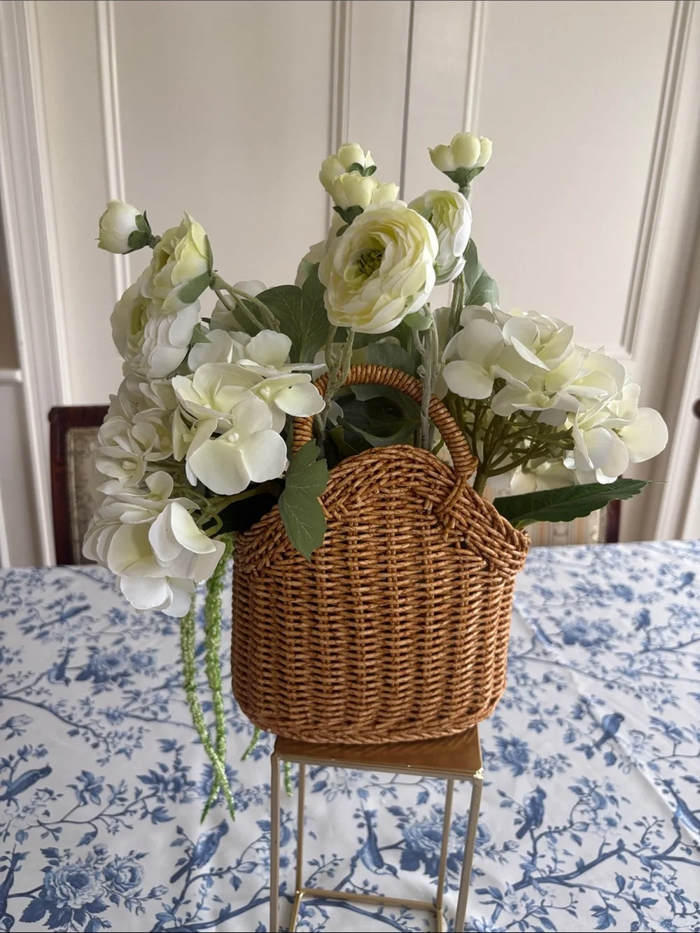 Woven Basket Floral Arrangement with White Hydrangeas and Green Accents